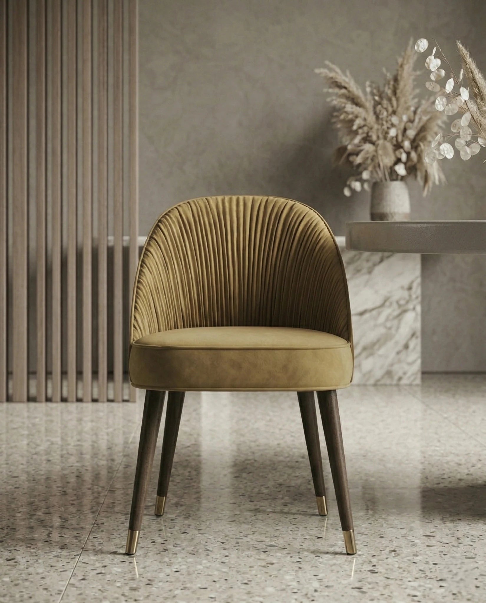 High-end designer upholstered chair and premium gold leather dining chair crafted by Arris Concepts Luxury Pvt. Ltd.