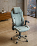 Modern executive desk chair and premium grey ergonomic office chair crafted by Arris Concepts Luxury Pvt. Ltd.
