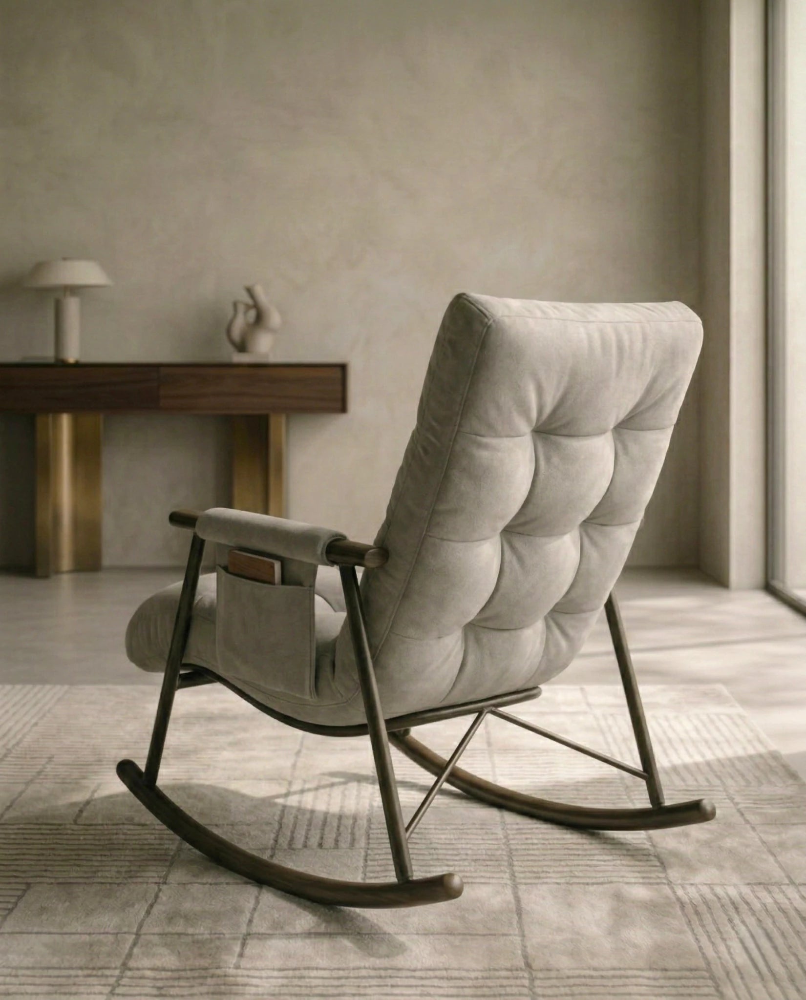High-end living room seating and premium grey modern rocking chair crafted by Arris Concepts Luxury Pvt. Ltd.