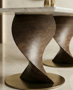 Modern wood base marble table and premium marble sculptural dining table by Arris Concepts Luxury Pvt. Ltd.