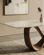 Beautiful premium onyx top dining table with sculptural base crafted by Arris Concepts Luxury Pvt. Ltd.