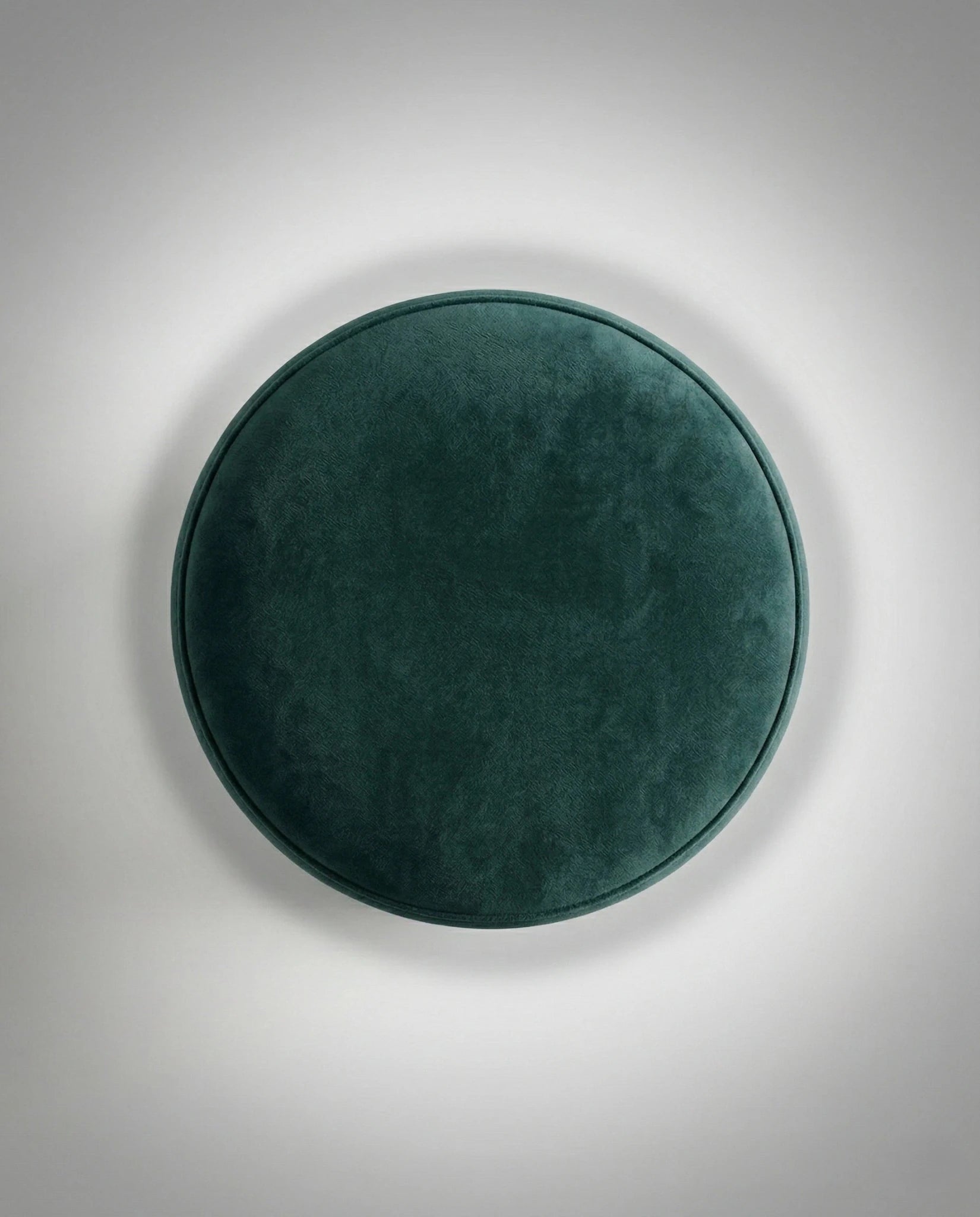 Beautiful premium round velvet pouf crafted by Arris Concepts Luxury Pvt. Ltd.