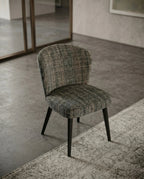 High-end fabric dining room chair and premium textured woven dining chair crafted by Arris Concepts Luxury Pvt. Ltd.