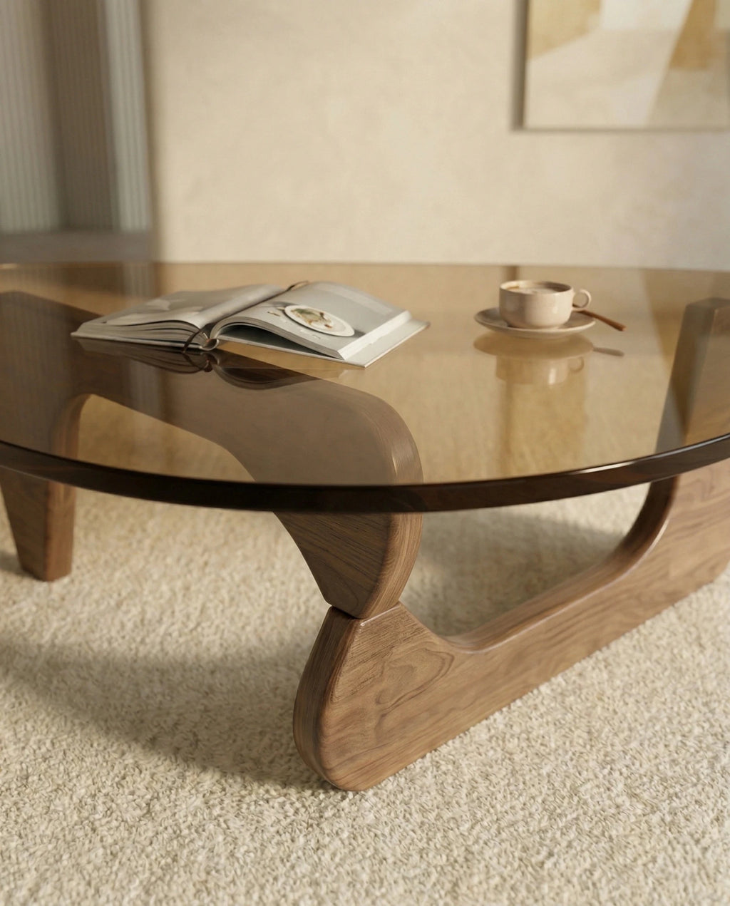 A premium tinted glass coffee table with a modern mid century center table base by Arris Concepts Luxury Pvt. Ltd.