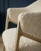 Modern designer seating and premium white leather dining chair by Arris Concepts Luxury Pvt. Ltd.