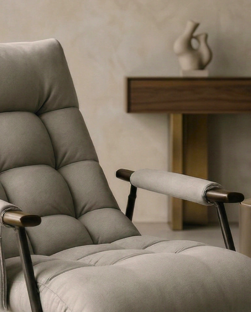 High-end living room seating and premium grey modern rocking chair crafted by Arris Concepts Luxury Pvt. Ltd.