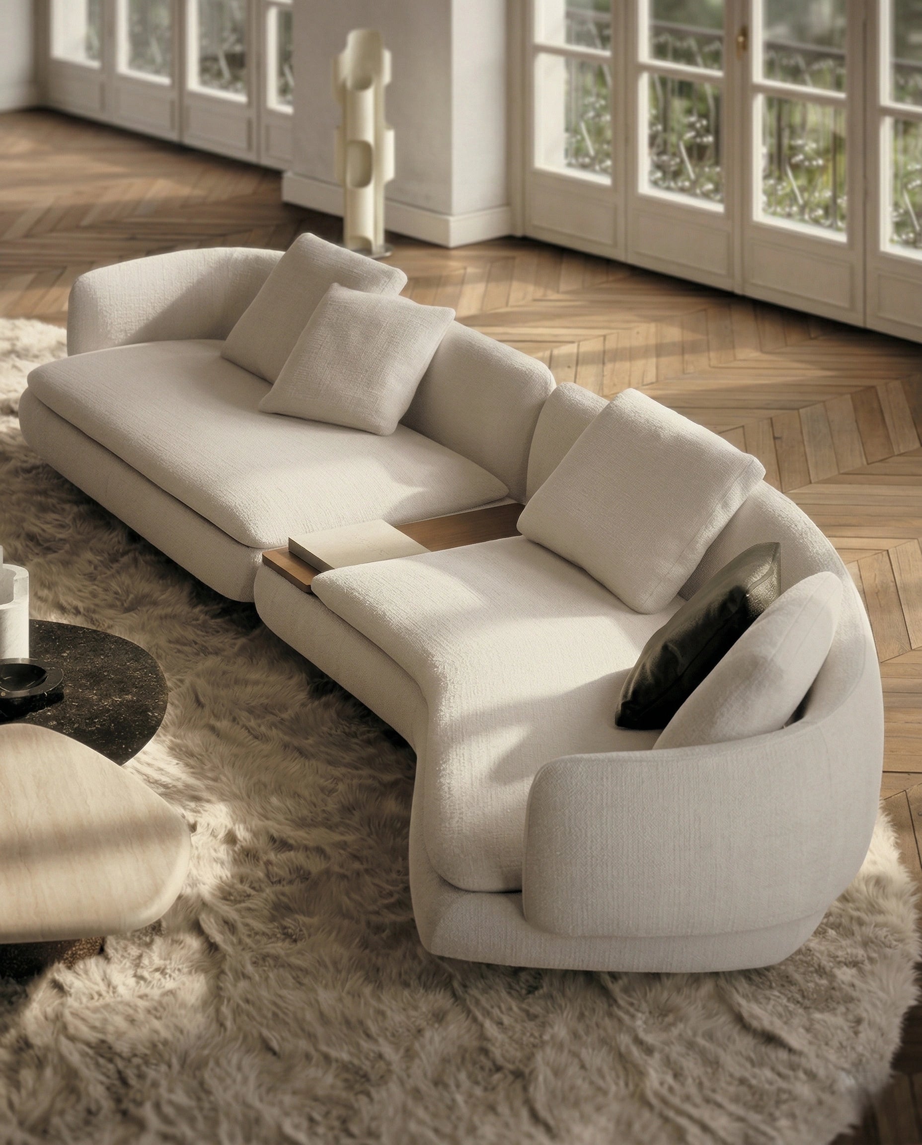 Beautiful premium curved boucle sofa with wood table crafted by Arris Concepts Luxury Pvt. Ltd.