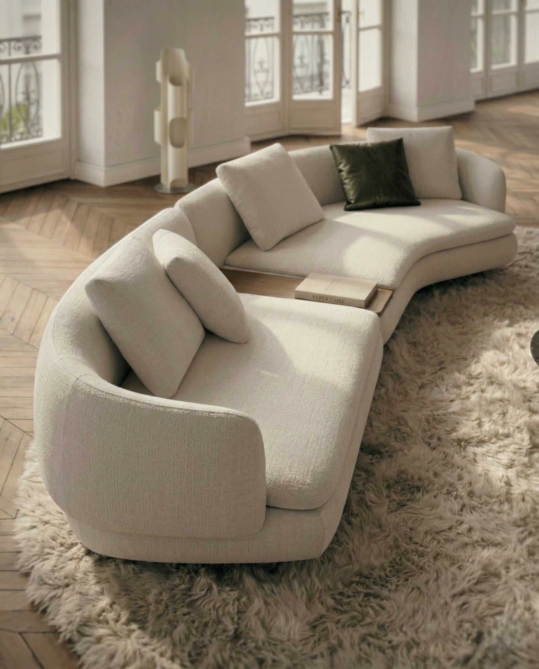 Beautiful premium curved boucle sofa with wood table crafted by Arris Concepts Luxury Pvt. Ltd.