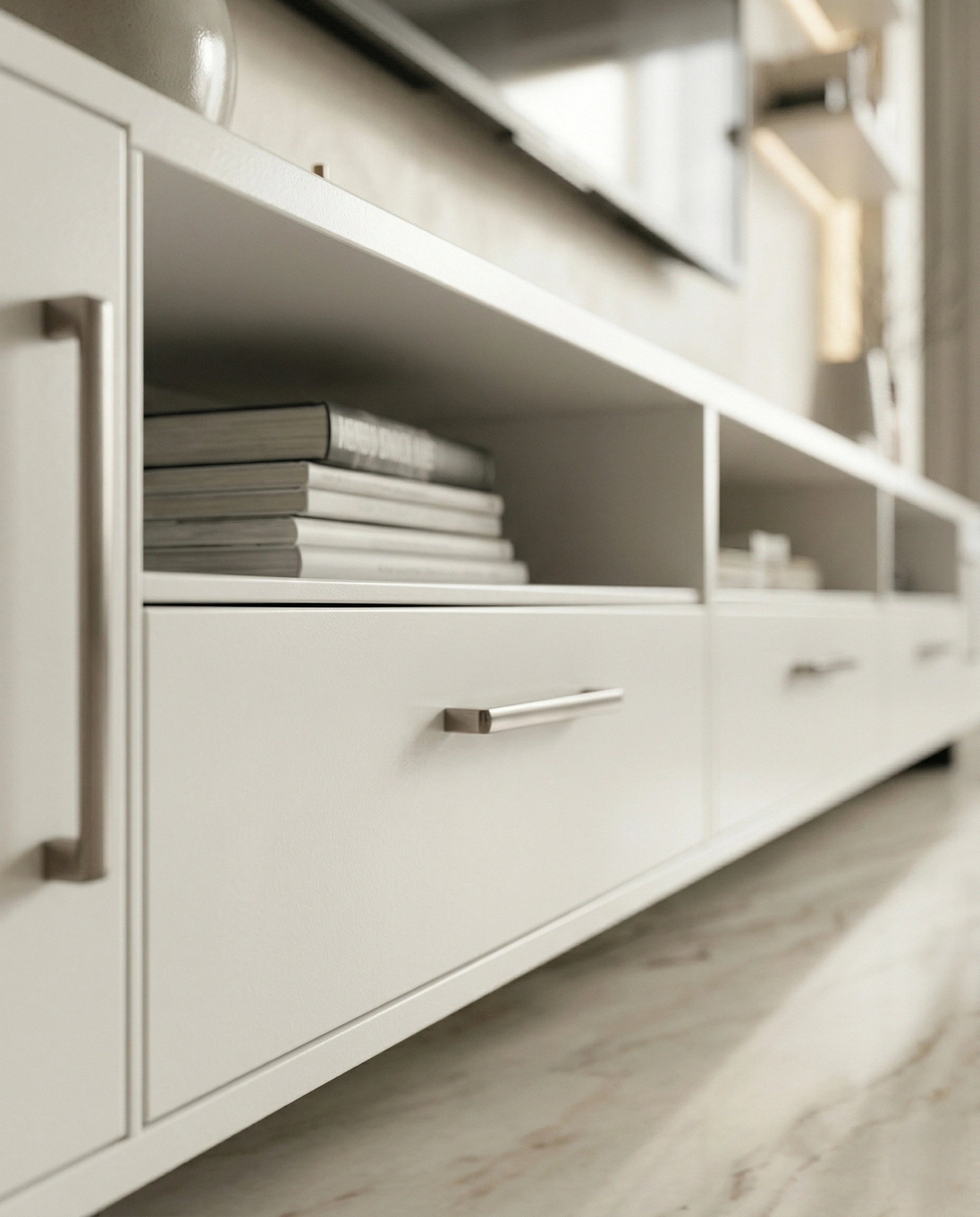 Beautiful premium minimalist white tv ledge crafted by Arris Concepts Luxury Pvt. Ltd.