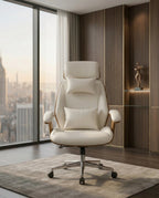 A white leather and wood office chair and modern executive desk chair by Arris Concepts Luxury Pvt. Ltd.