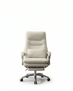 A white leather reclining office chair and modern executive desk chair by Arris Concepts Luxury Pvt. Ltd.
