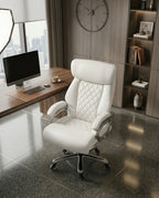 A white tufted executive desk chair and designer white home office seating by Arris Concepts Luxury Pvt. Ltd.