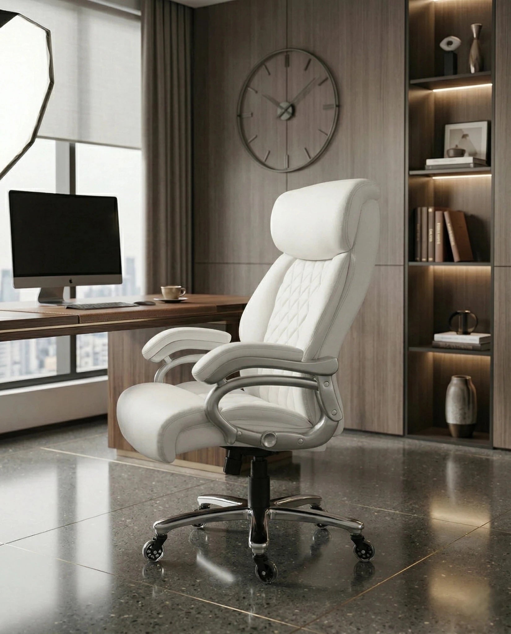 A white tufted executive desk chair and designer white home office seating by Arris Concepts Luxury Pvt. Ltd.